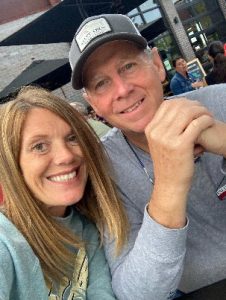 A selfie of Brenda Jordan, Admissions Coordinator at Curative Connections, with her husband.
